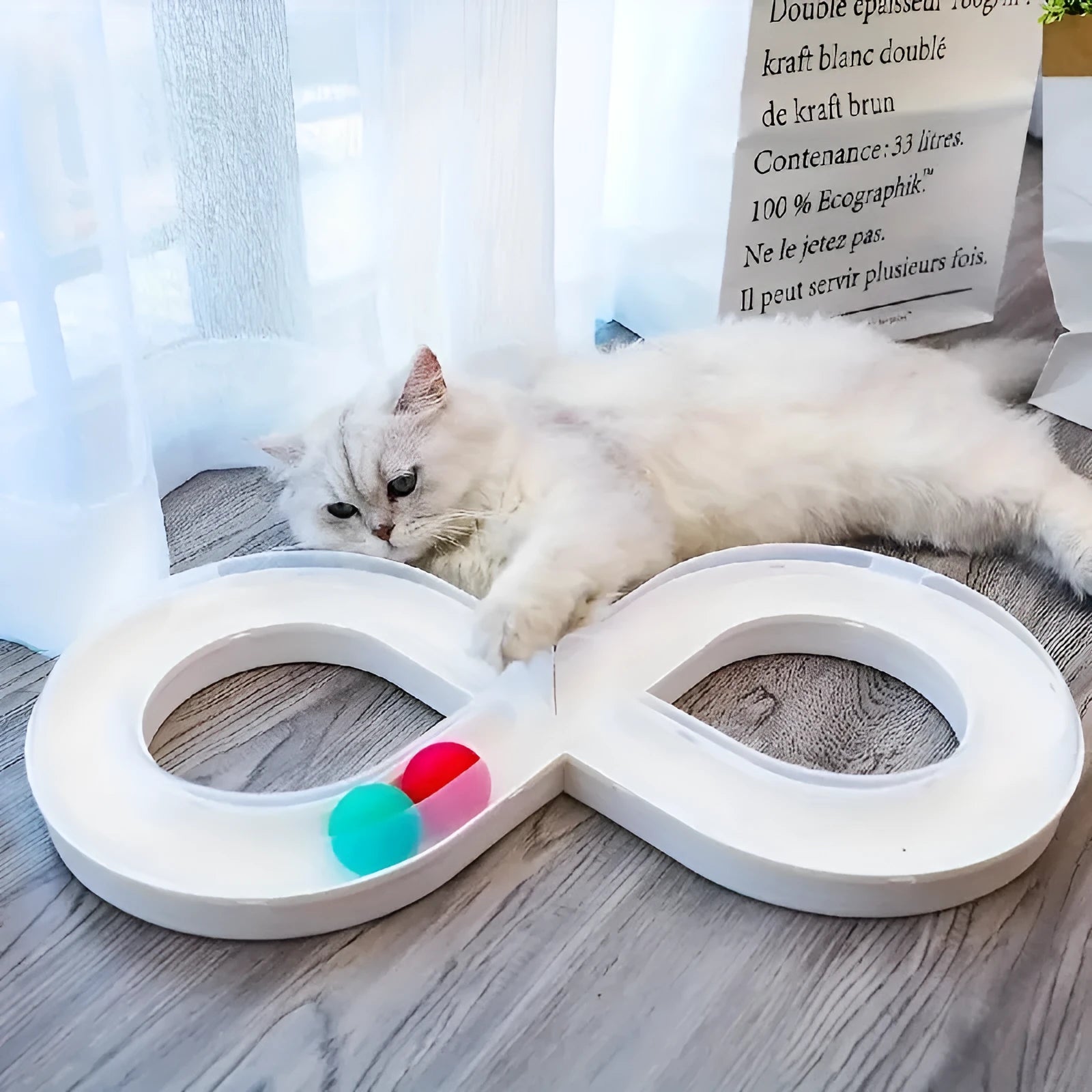Blue and white cat turntable track toy with ball measuring 50cm long