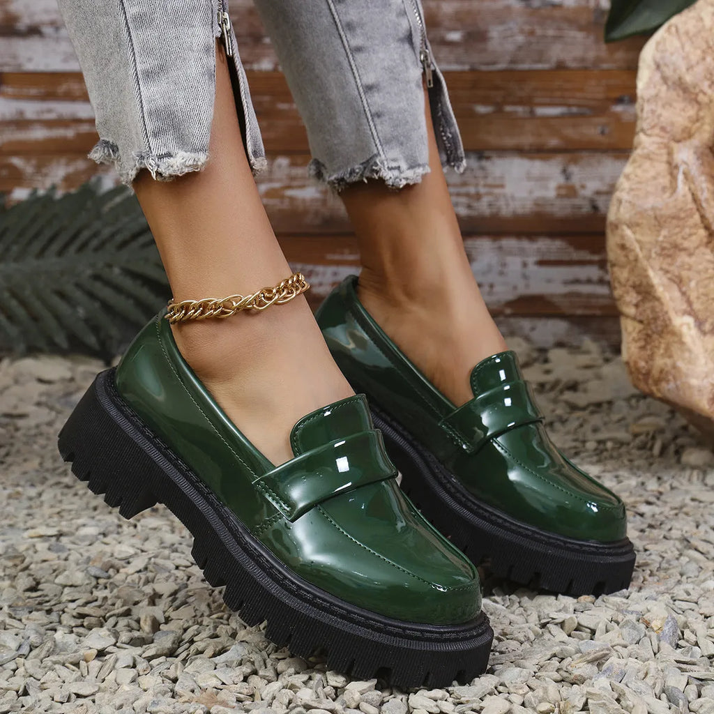 Plus size British style slip-on loafers with chunky platform heel in black, wine red, and green colours