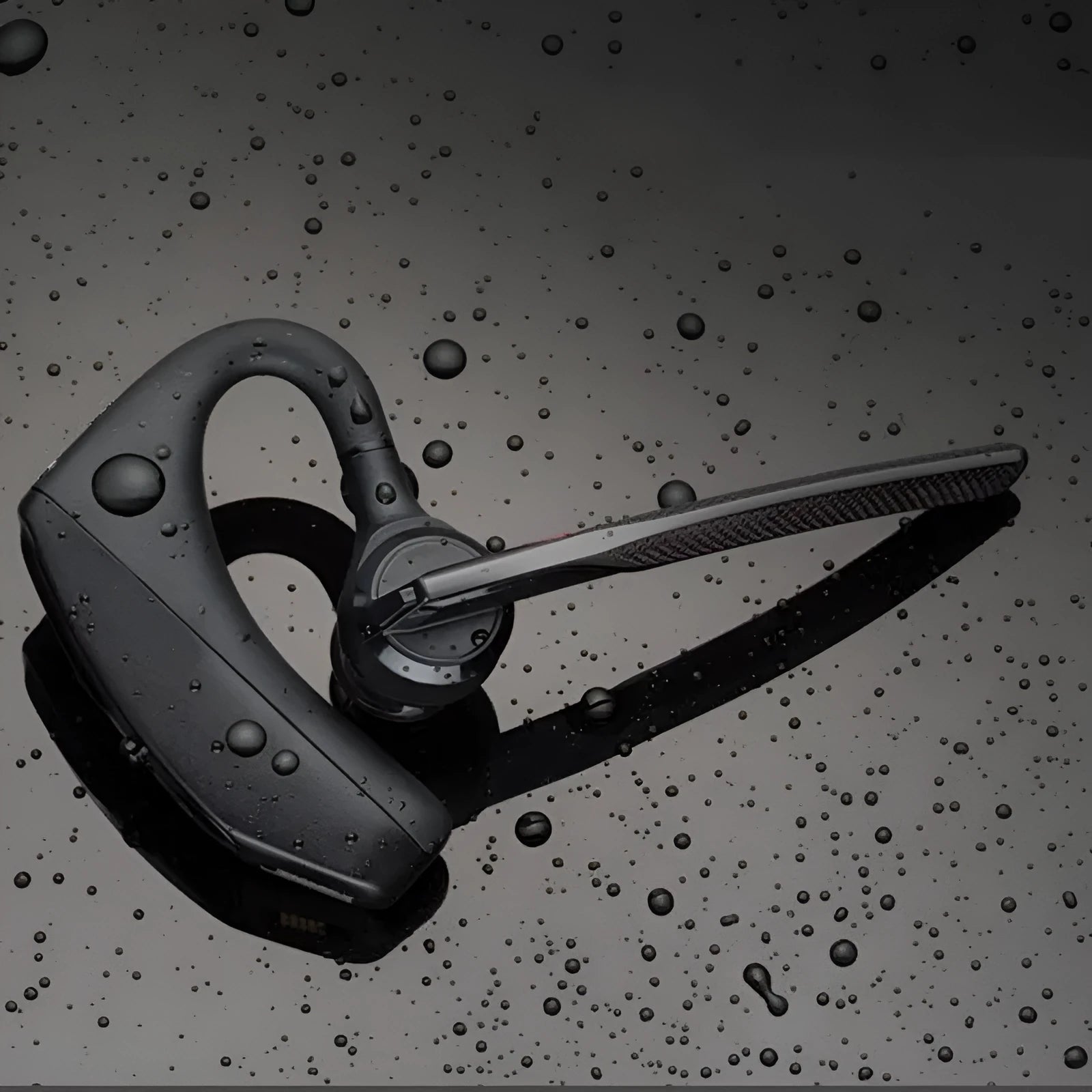 Black plastic Bluetooth sports headphones with USB charging port and battery display