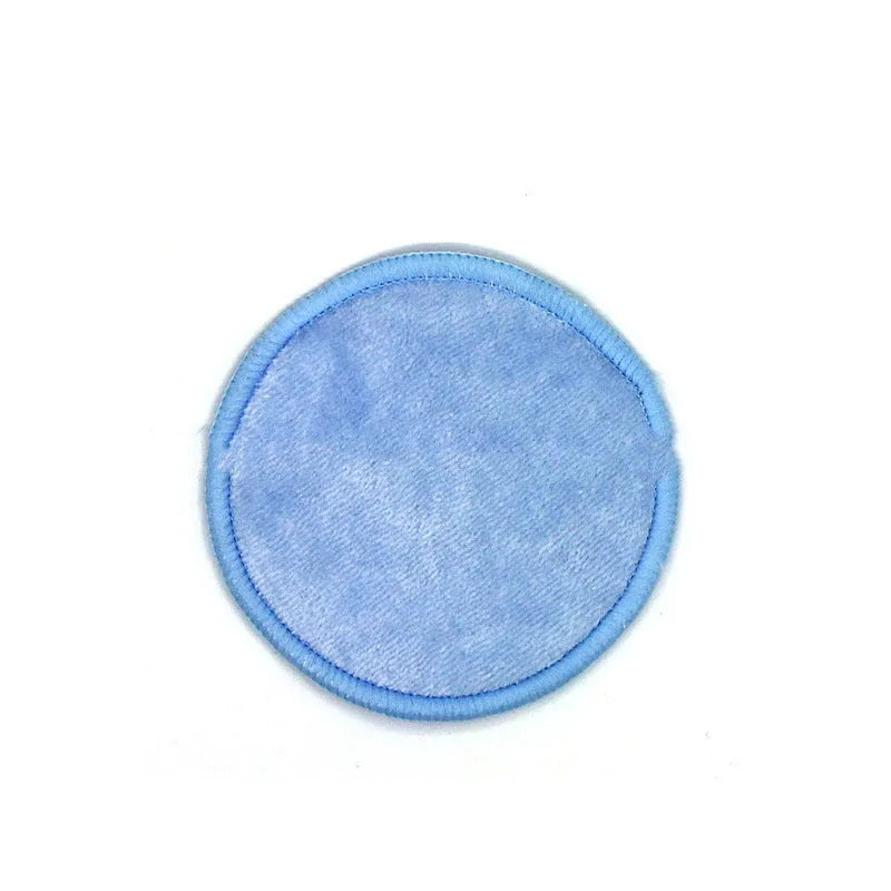 Set of red and blue velvet makeup remover pads next to a cotton mesh storage bag