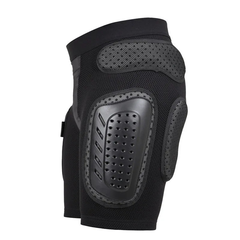 Black cycling hip protection pants showing integrated padding, available in sizes S, M, L, XL.