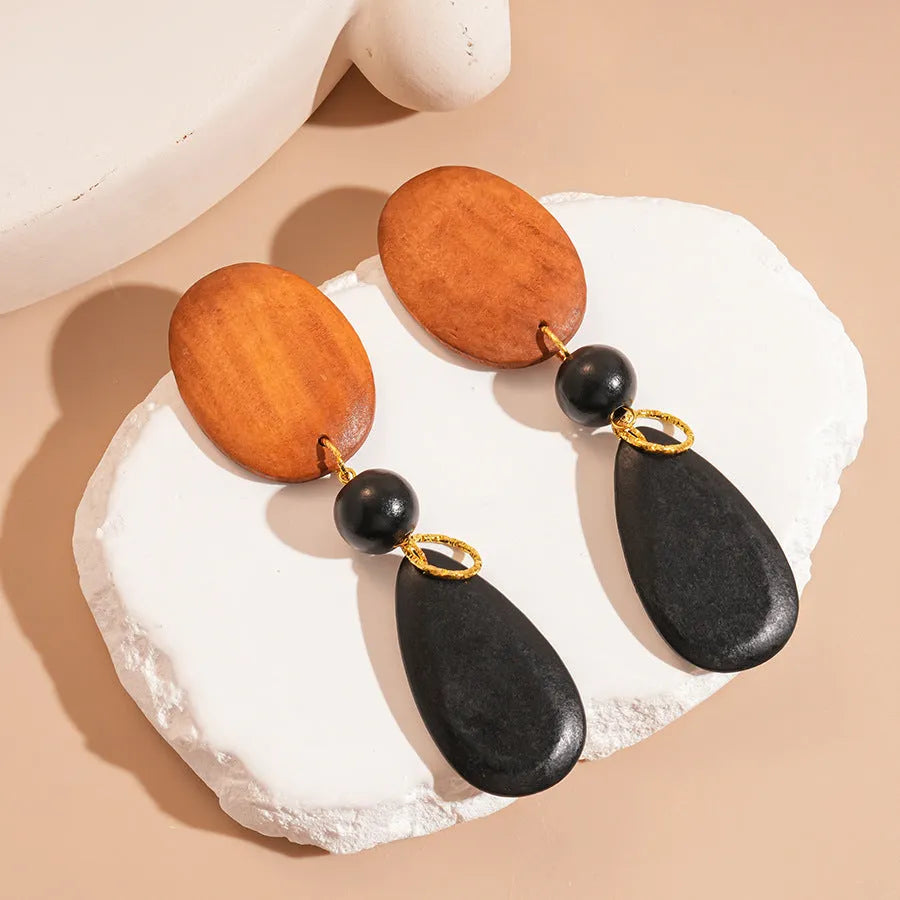 Retro wooden ellipse earrings in silver needle brown-black colour with manual craftsmanship