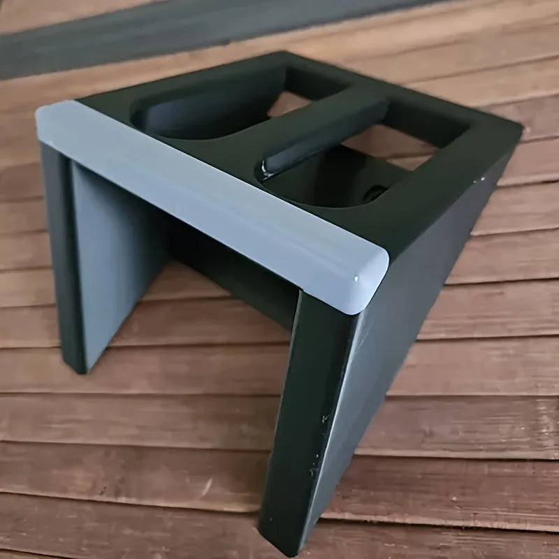 Black punk-style plastic pistol stand for firearm display
