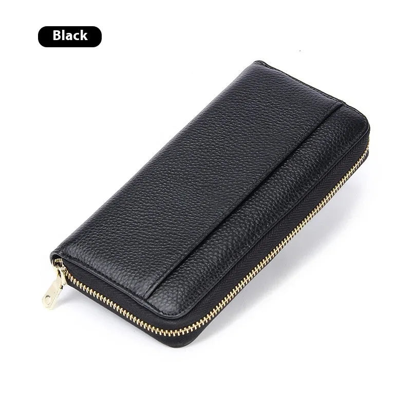 Women's long genuine leather wallet in multiple colours showing zip-around closure and anti-theft card slots.