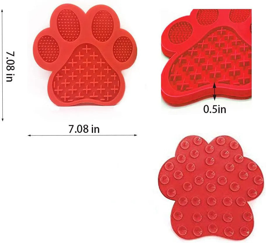 Blue bone-textured silicone dog licking mat with suction cups on back, shown on a tiled wall.
