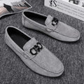 Men's black and grey suede casual shoes with leather details and rubber sole