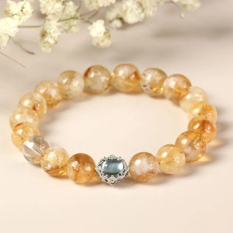 Geometric citrine crystal bracelet with 10mm stones on a metal setting, unisex design.