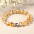 Geometric citrine crystal bracelet with 10mm stones on a metal setting, unisex design.