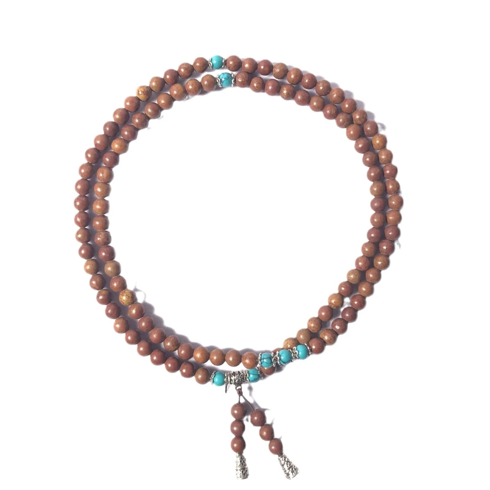 Handmade geometric bracelet with 108 smooth Lvzhu stone beads.