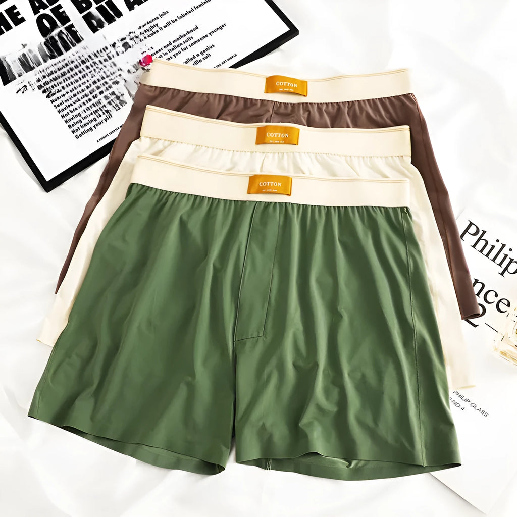 Men's loose-fit ice silk underwear in a solid colour on a mid-waist.