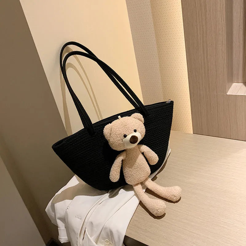 Cotton and linen woven shoulder bag in dumpling shape with three-dimensional pocket and double straps