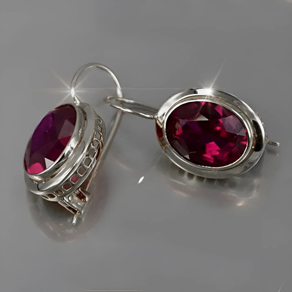 Women's minimalist earrings with red oval gemstone in geometric hollow design, silver electroplated alloy