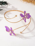 Personalised hollow pattern alloy armband in pink or purple colour on wrist