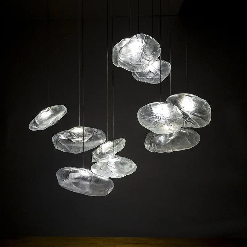 Modern fabric-style glass LED chandelier with clear, amber, or smoke grey shade, shown in small and large sizes.