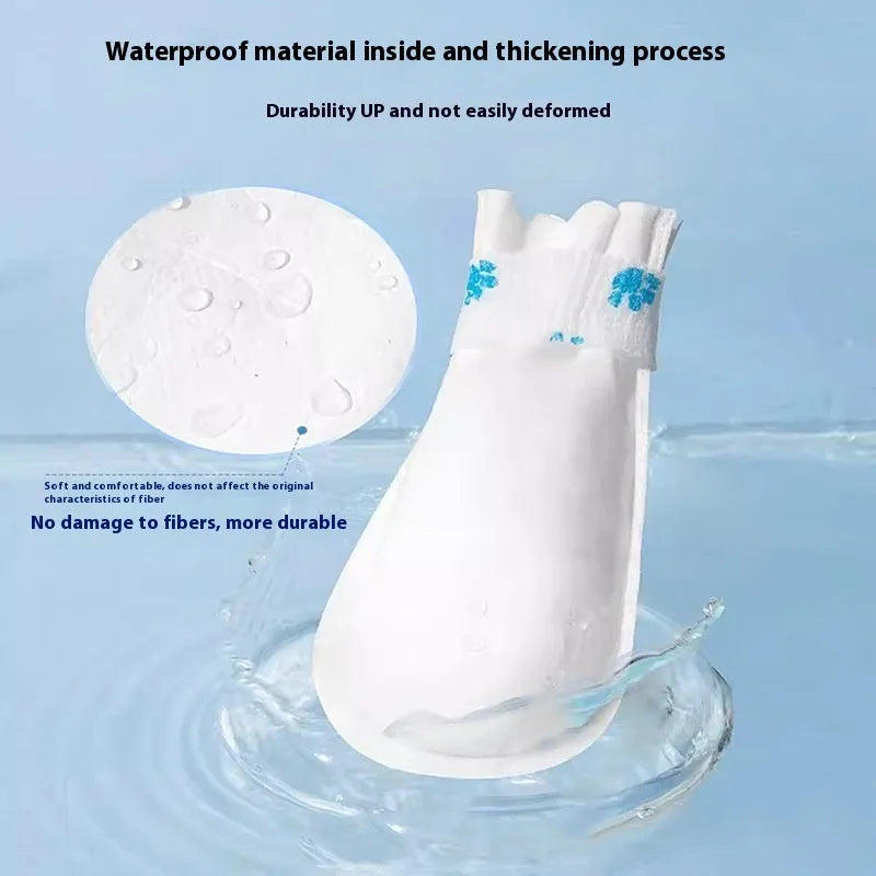 White disposable waterproof shoe covers for dogs on a pet's paw, shown in S and M sizes.