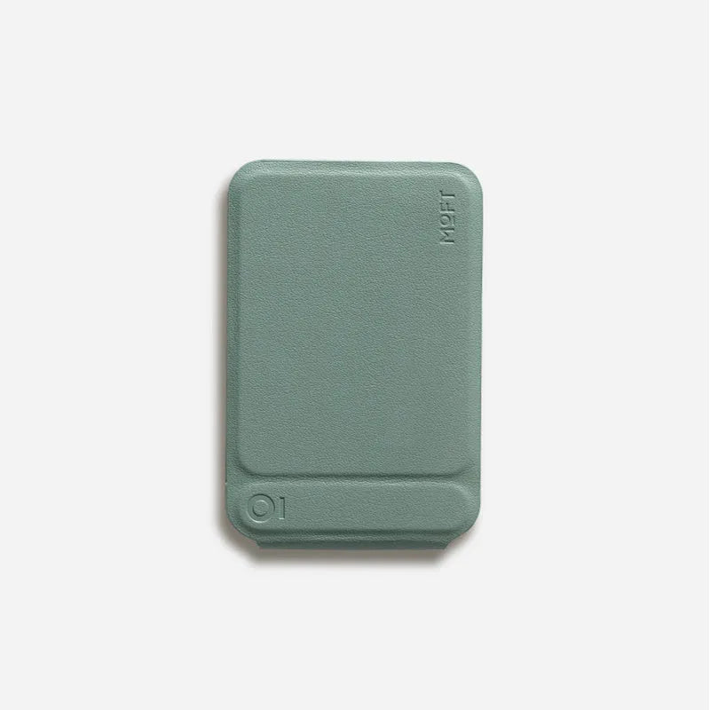 Magnetic mobile phone holder and case in leather with built-in stand, shown in grey.