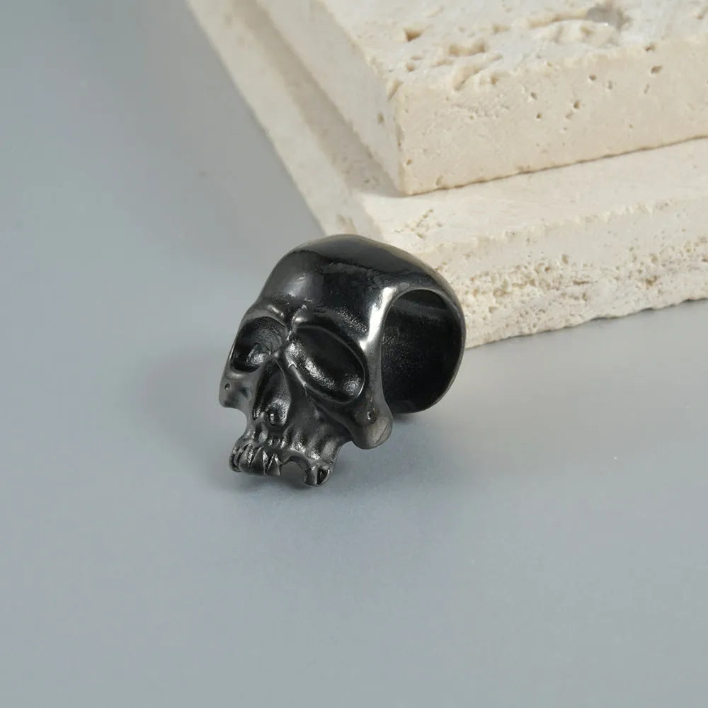 Stainless steel hollow skull Buddha earrings showing geometry shape and electroplated colour options