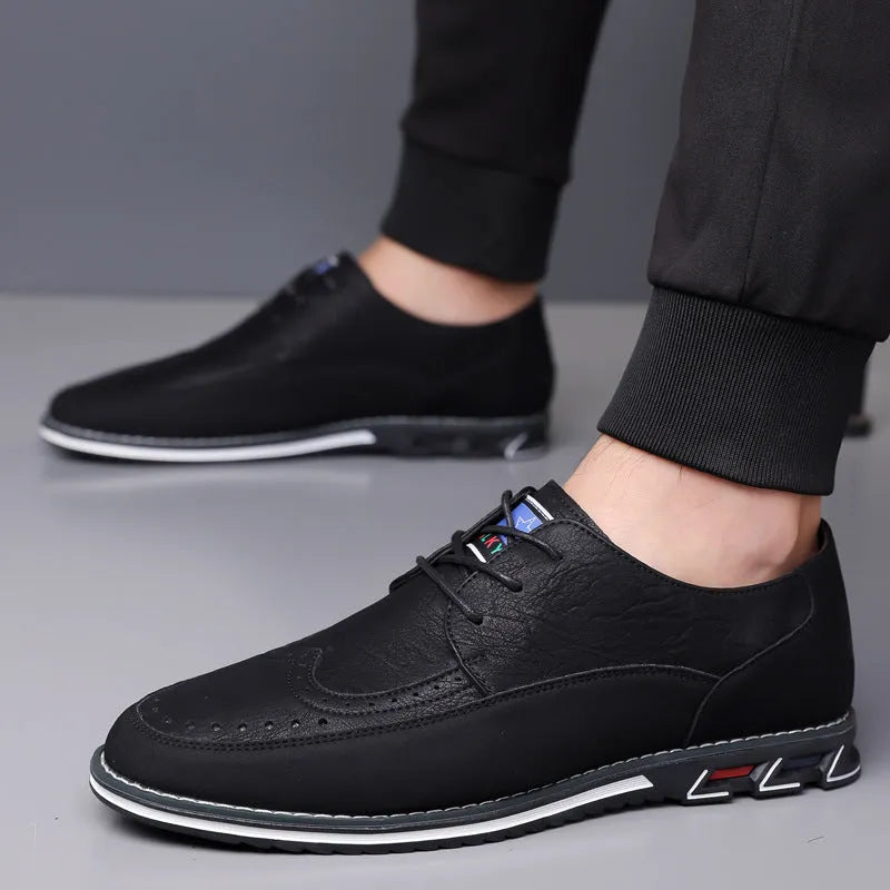 Men's black casual leather shoes with a rubber sole and leather toe cap.
