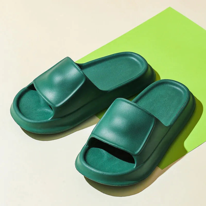 Soft EVA flip-flop slippers with thick sole in multiple colours on a white background.