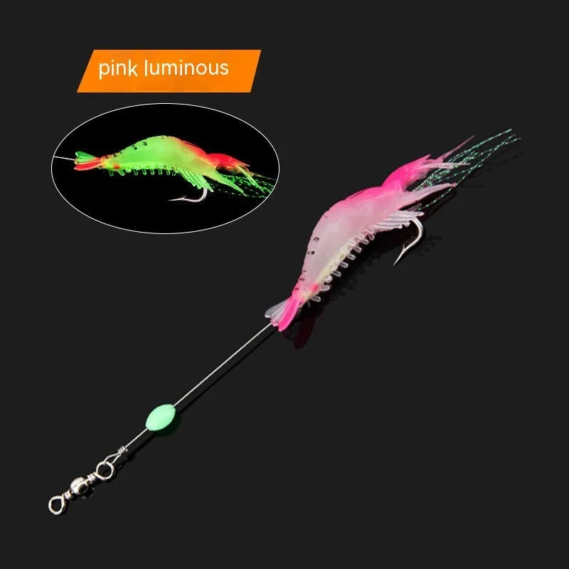 Six soft plastic fishing lures with integrated hooks in different colour variations including luminous patterns