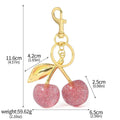Zinc alloy cherry charm key ring with three-dimensional design in red or pink colour