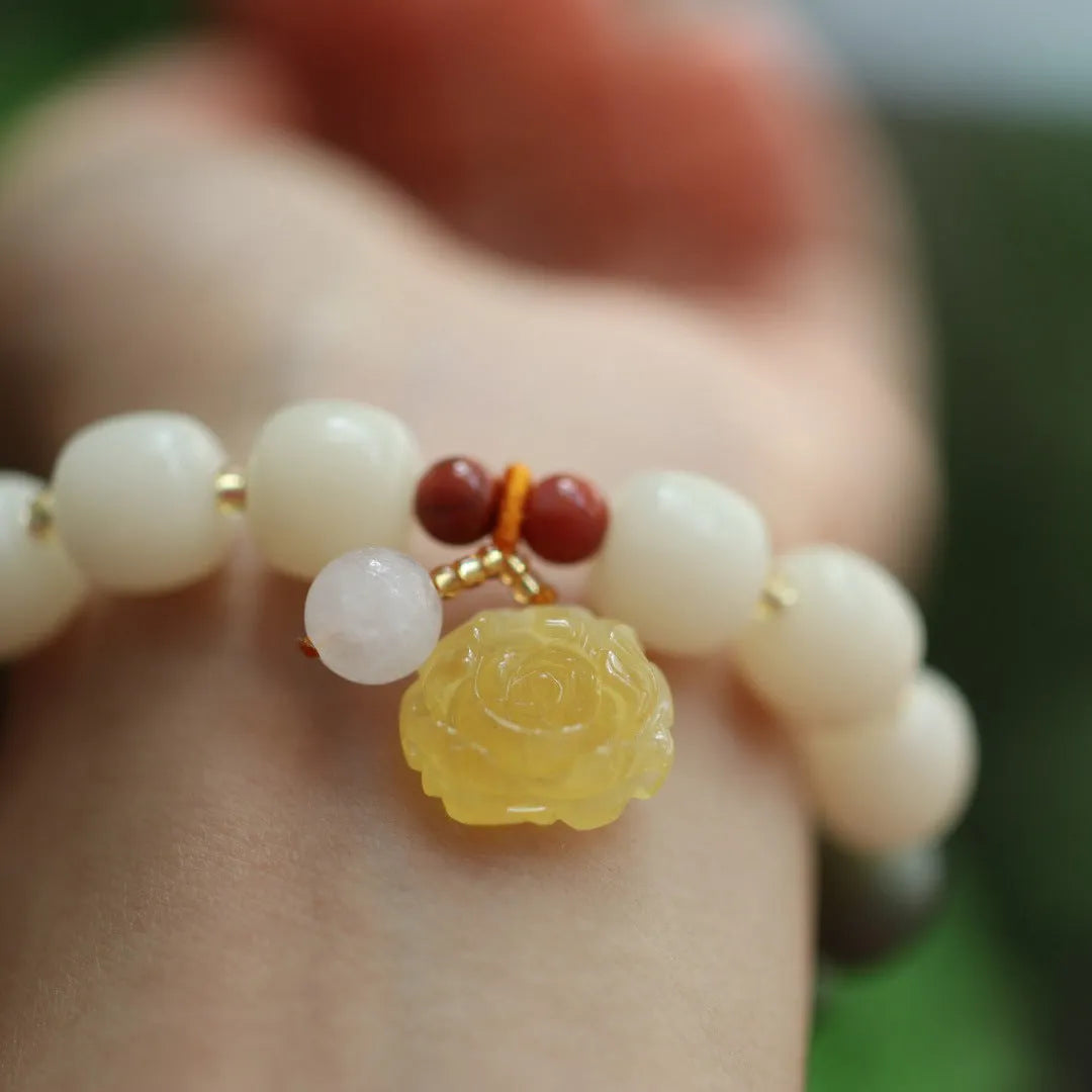 Gradient white jade Bodhi root bracelet with natural beeswax Lotus pendant on wrist