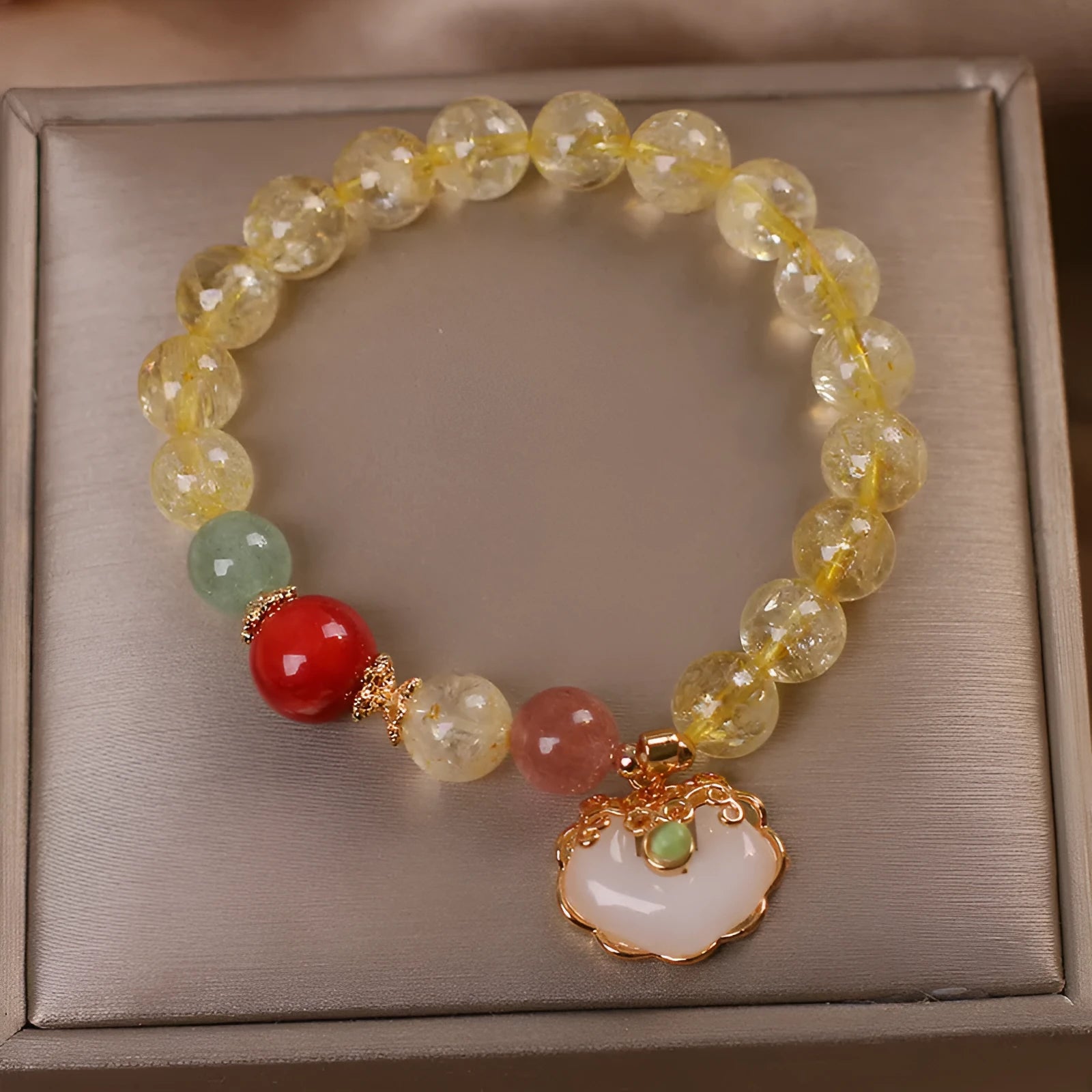 Women's alloy bracelet with a yellow citrine jade ruyi pendant in an original design.