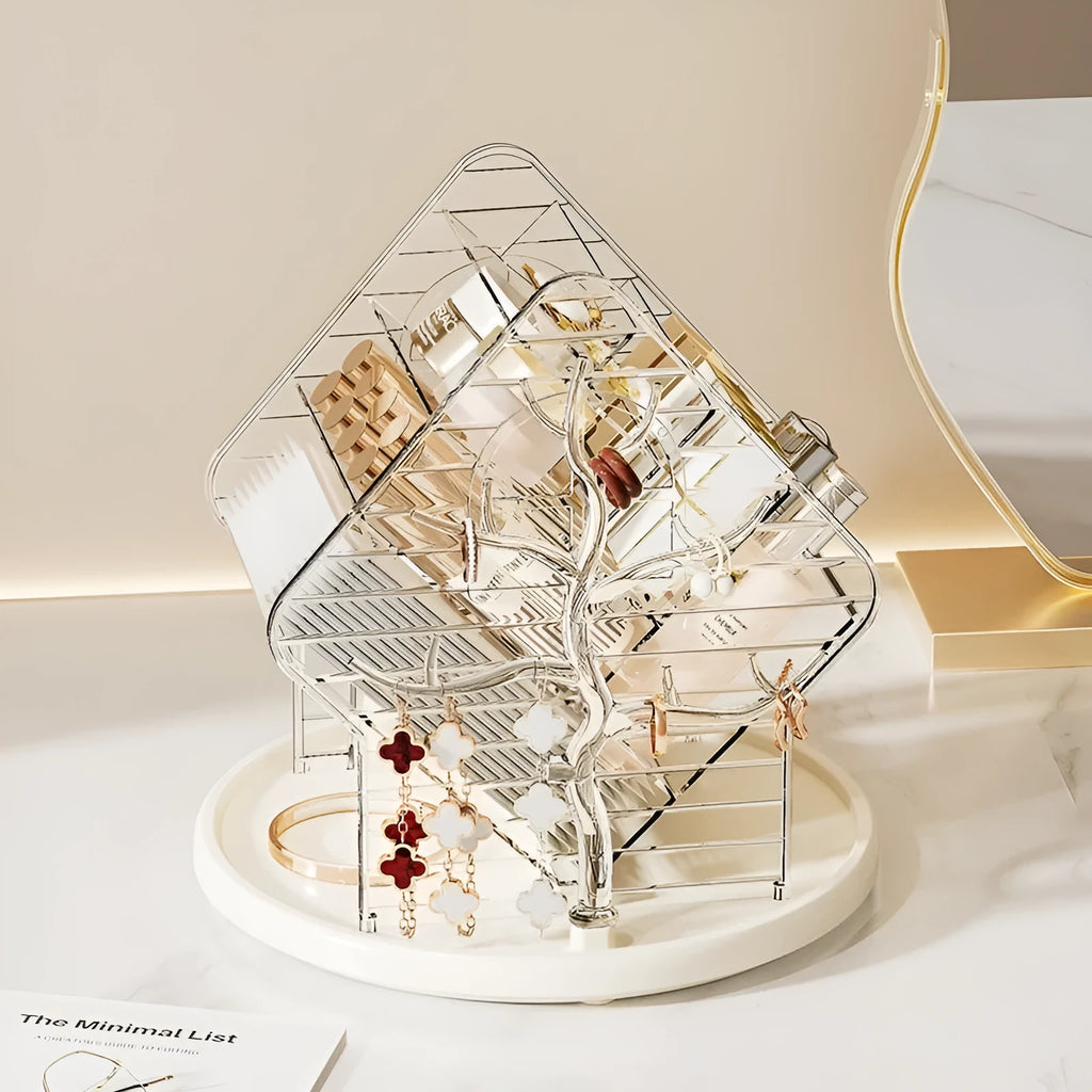 360 degree rotating cosmetics storage organiser box in clear and Amber Gold colours on a table.