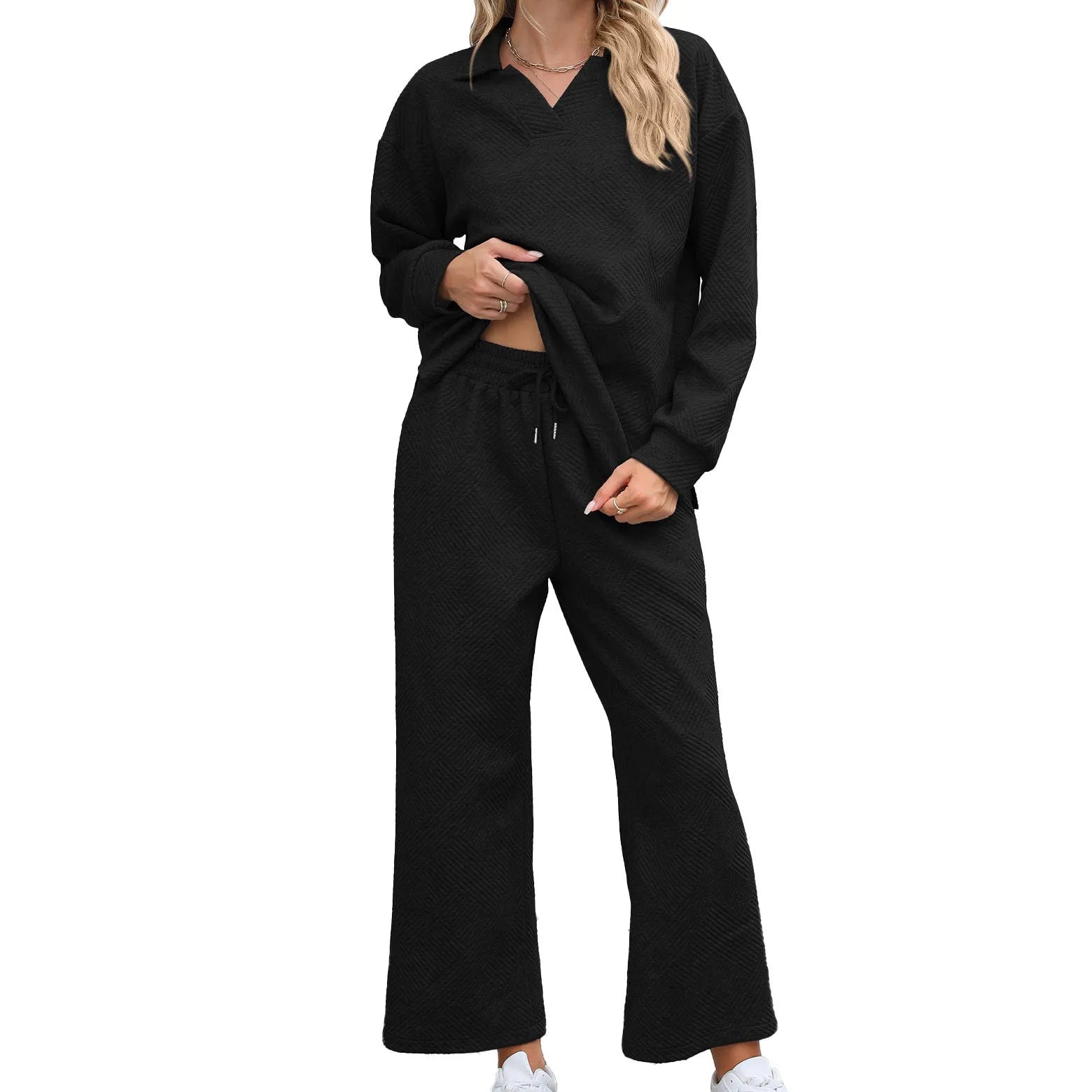 Women's black geometric pattern knitted jacquard long sleeve top and elastic waist cropped pants suit set.