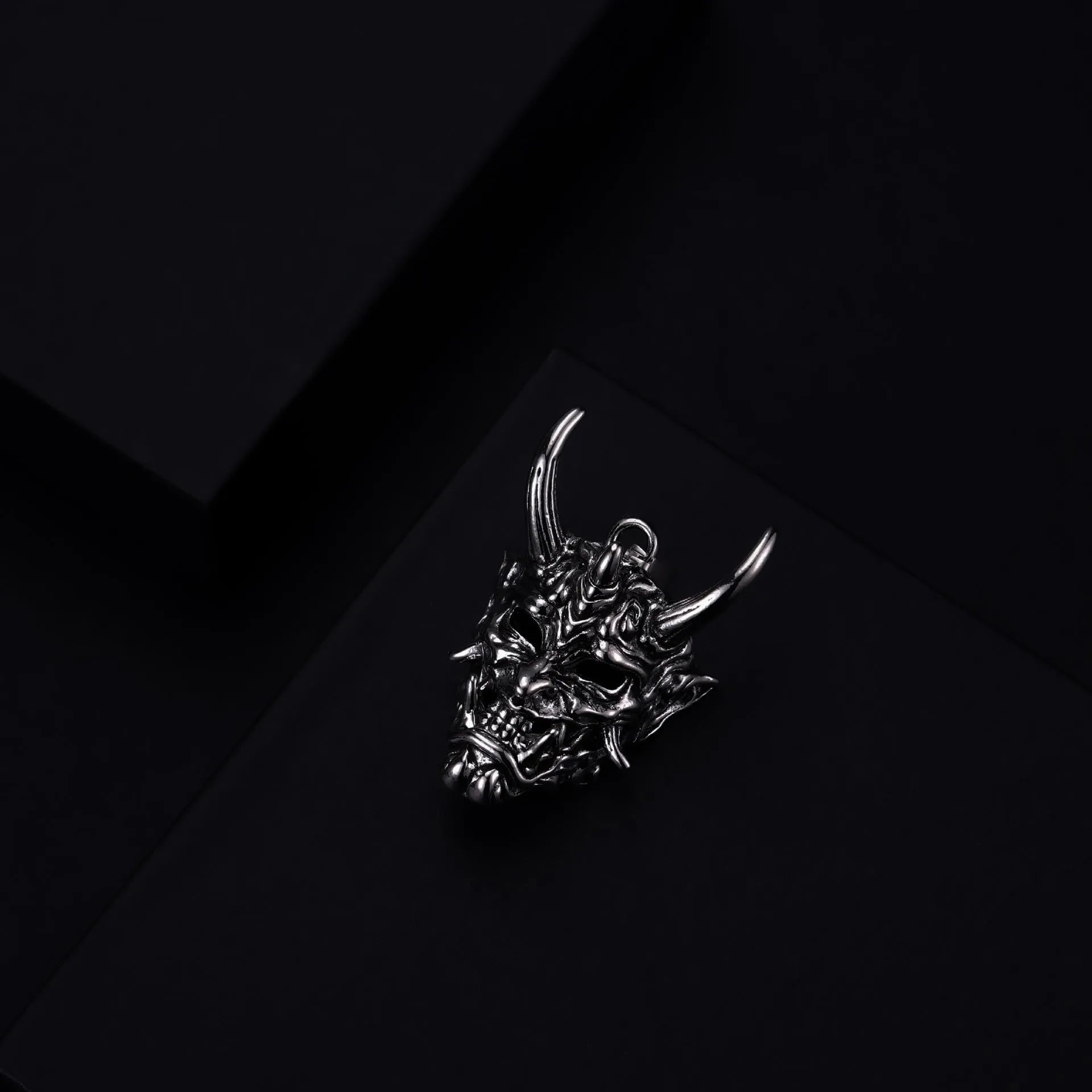 Men's silver electroplated zinc alloy pendant necklace measuring 40mm wide by 27mm high