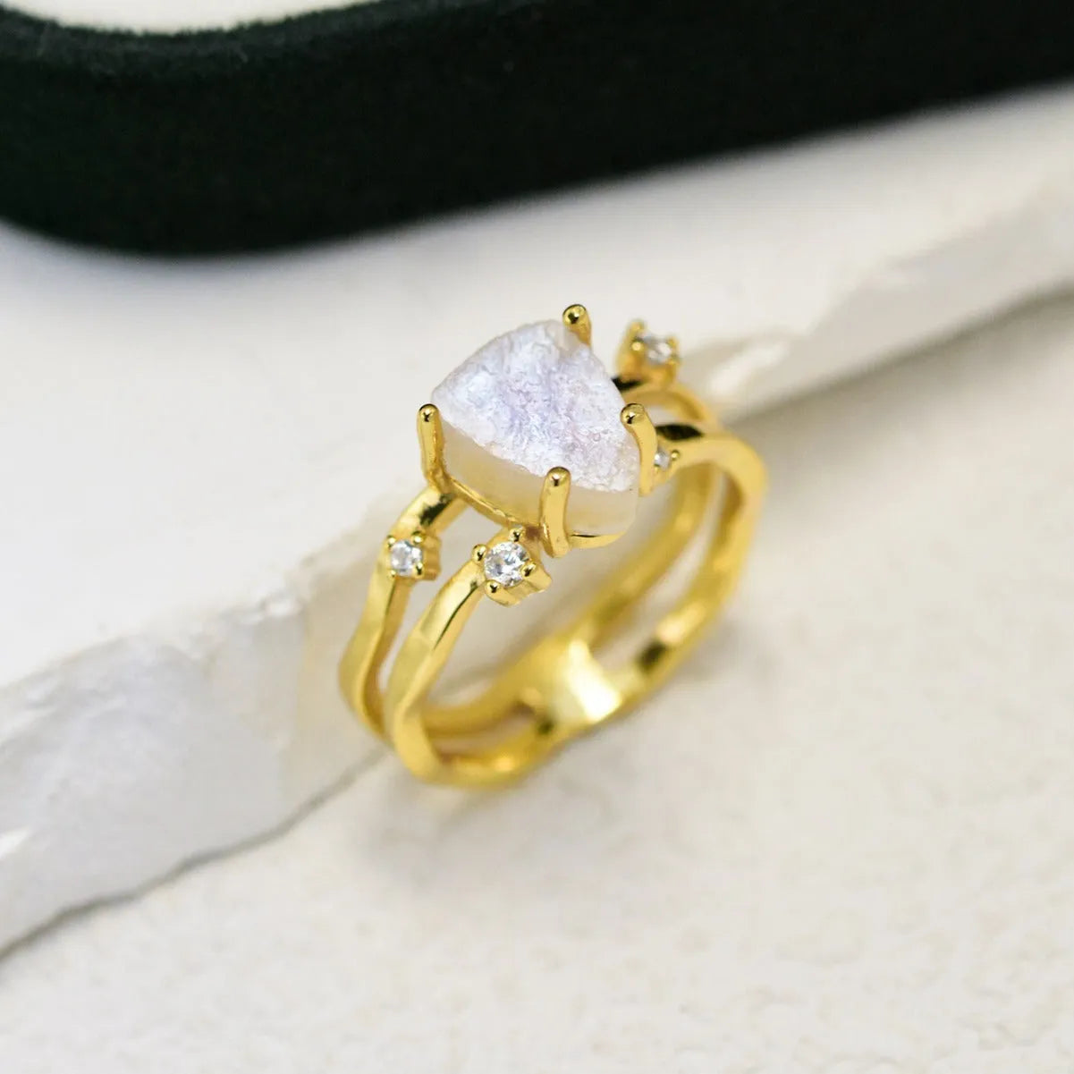 S925 silver ring with irregular triangle shape and moonstone in rose gold, white gold, or yellow gold finish.