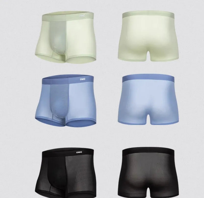 Men's lightweight seamless fitness shorts in black, blue, green, or silver on a size chart
