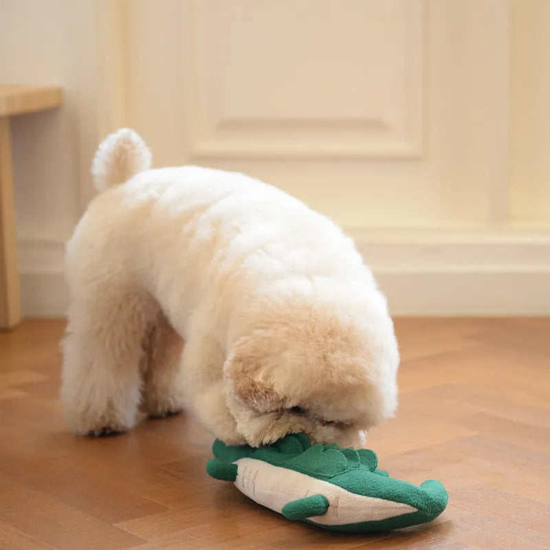 Green interactive plush dog toy with squeaker and crinkle sounds, measuring 35 cm long.