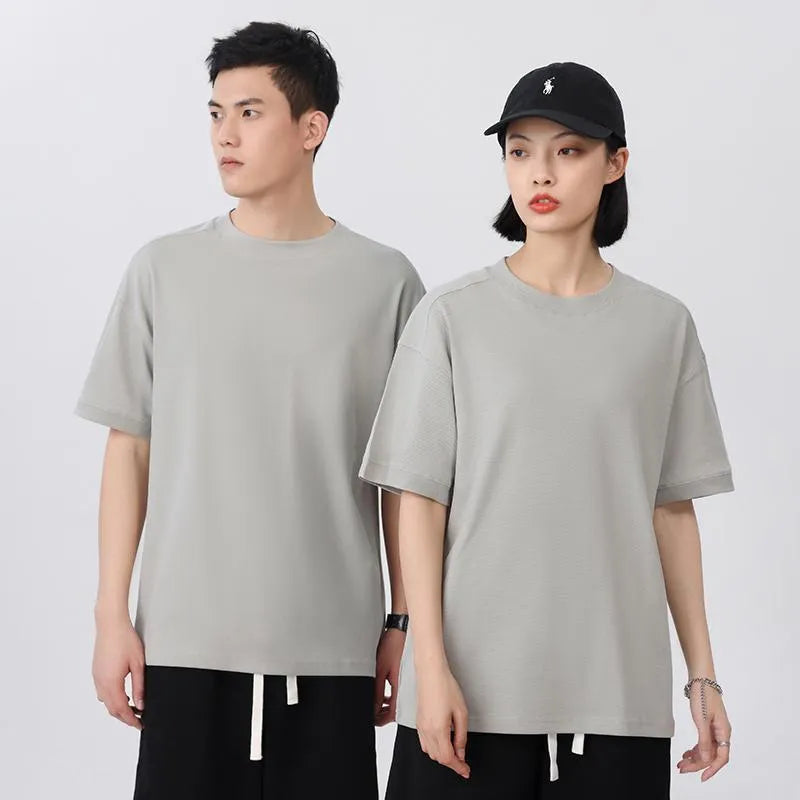 Breathable pique short-sleeved cotton T-shirt in loose fit, solid colour, summer wear