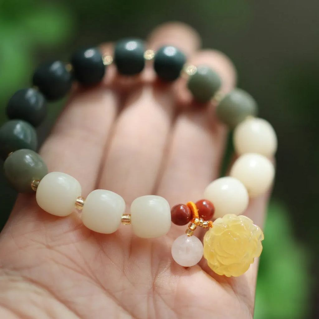 Gradient white jade Bodhi root bracelet with natural beeswax Lotus pendant on wrist