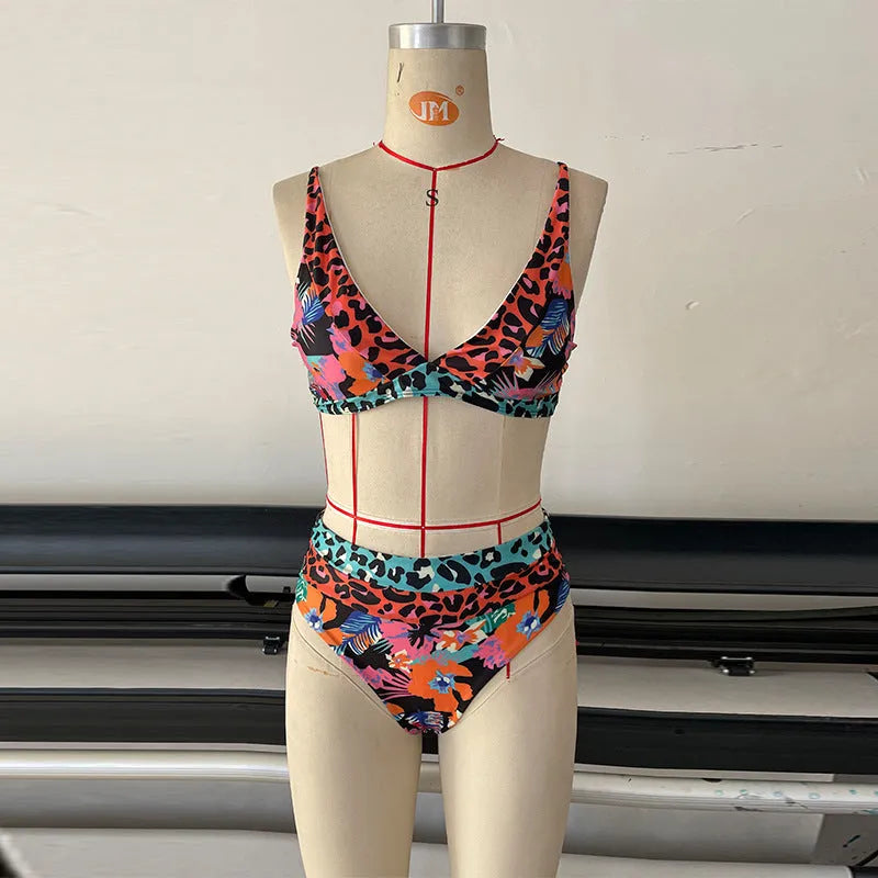 Women's high-waist floral print bikini swimsuit set on a mannequin.