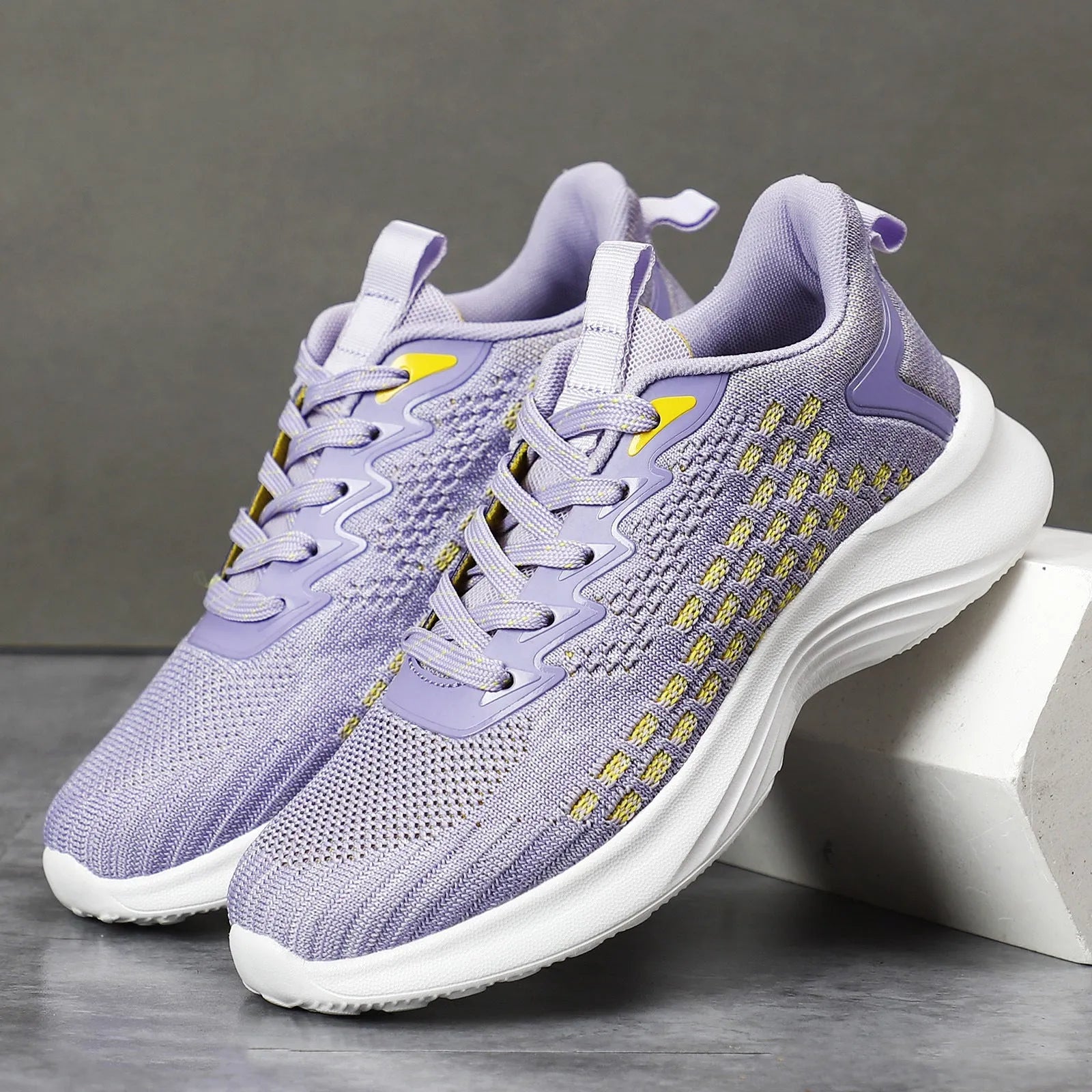 Women's lavender purple mesh running shoes with striped pattern and EVA sole for jogging