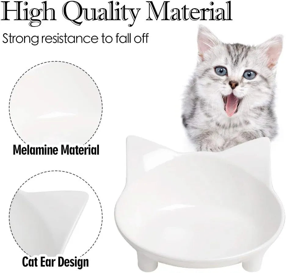 White shallow melamine cat bowl with non-slip rubber base on a wooden table.