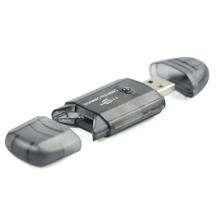 Transparent plastic USB card reader with LED light on a desk