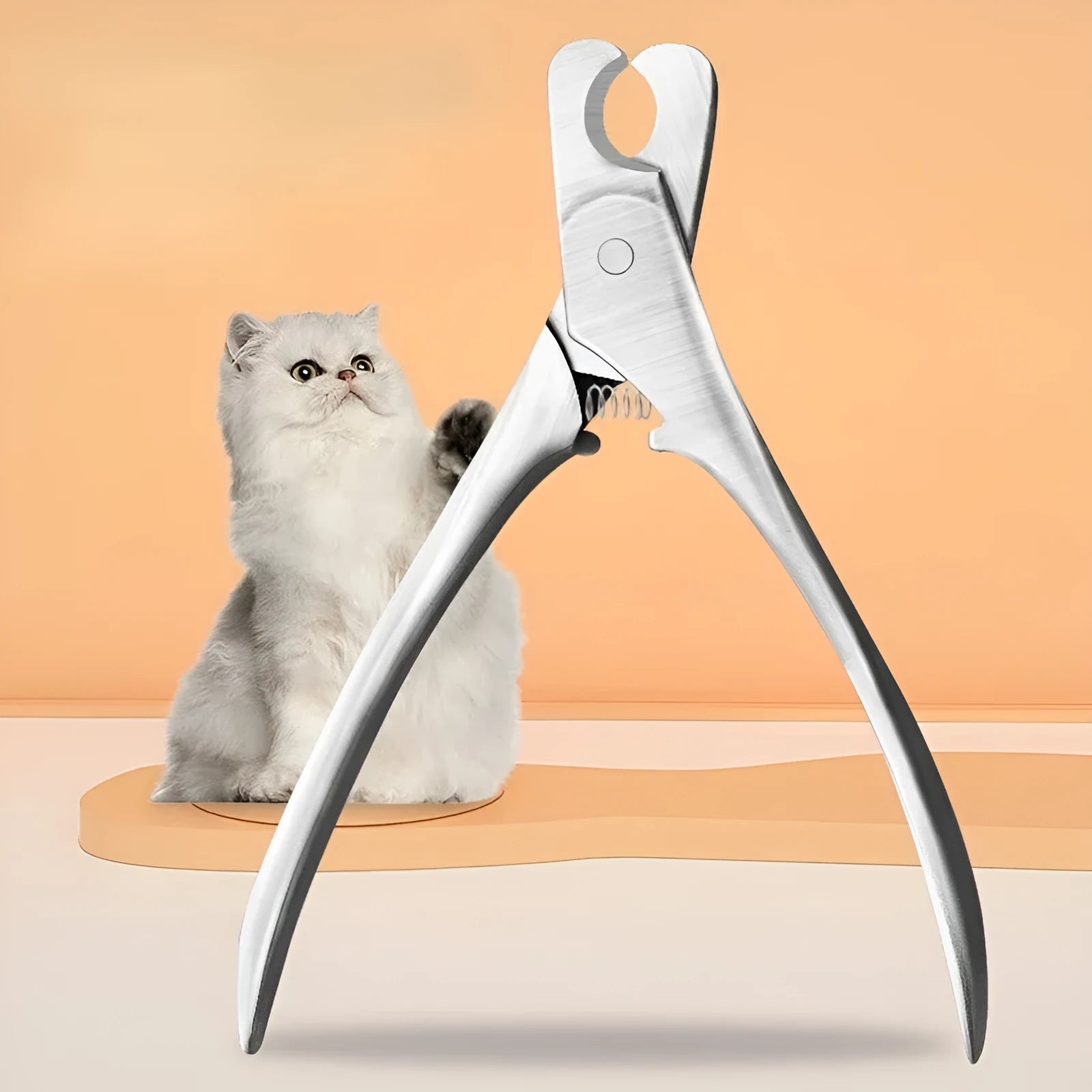 Silver professional pet nail clipper with stainless steel blades for trimming dog and cat claws.