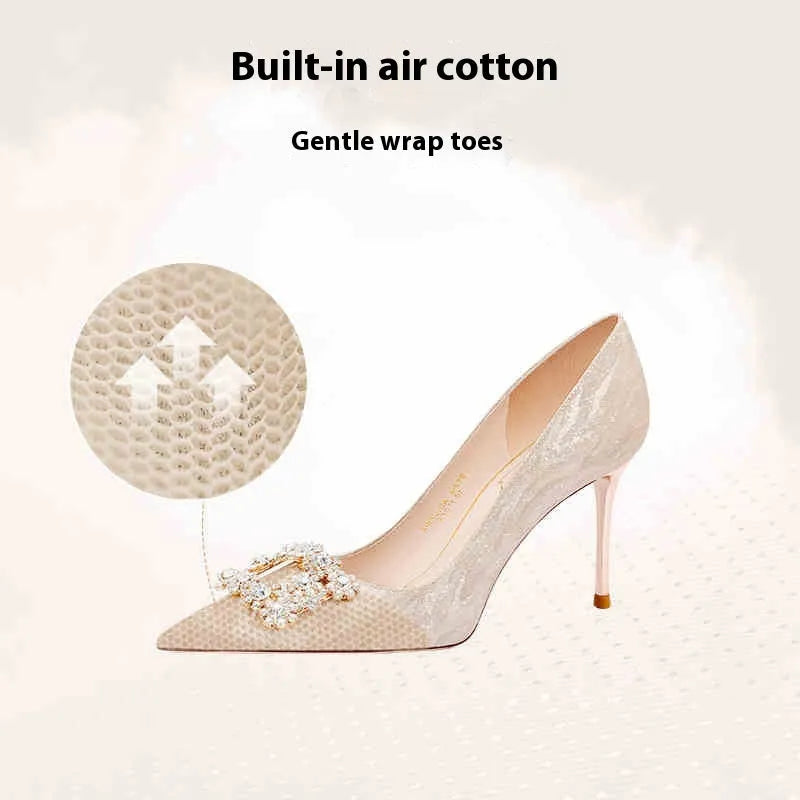 Champagne gold women's leather high heel pumps with pointed toe, stiletto heel, and rhinestone decoration.