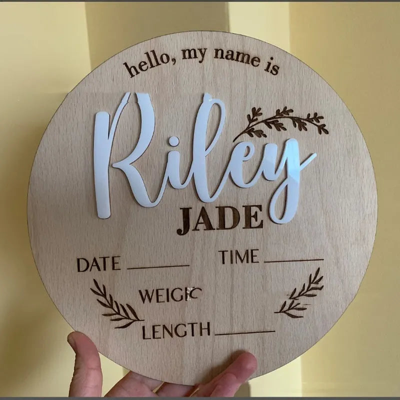 15cm square wooden newborn name label with birth information displayed on plywood plaque