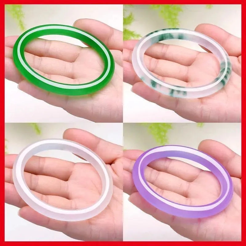 Women's jade bracelet with floating flower design in ice-like emerald appearance