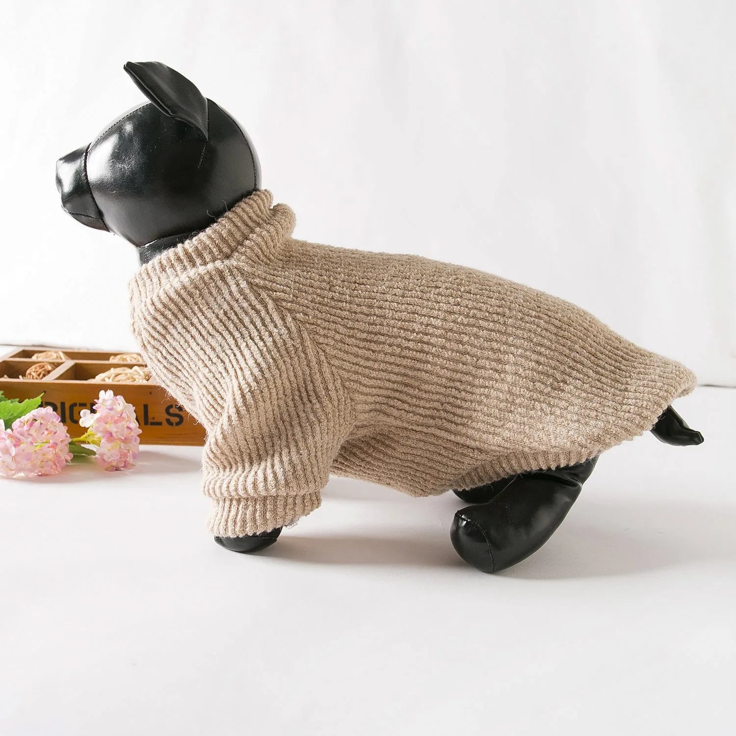 Brown cloth pullover sweater for small breed dog on model showing size fit