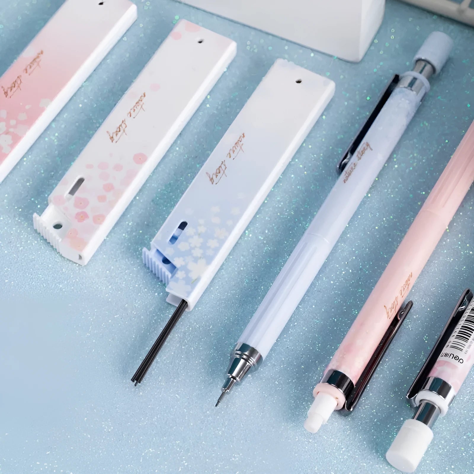 Sakura law cartoon automatic pencil set with three 0.5mm pencils and refill boxes