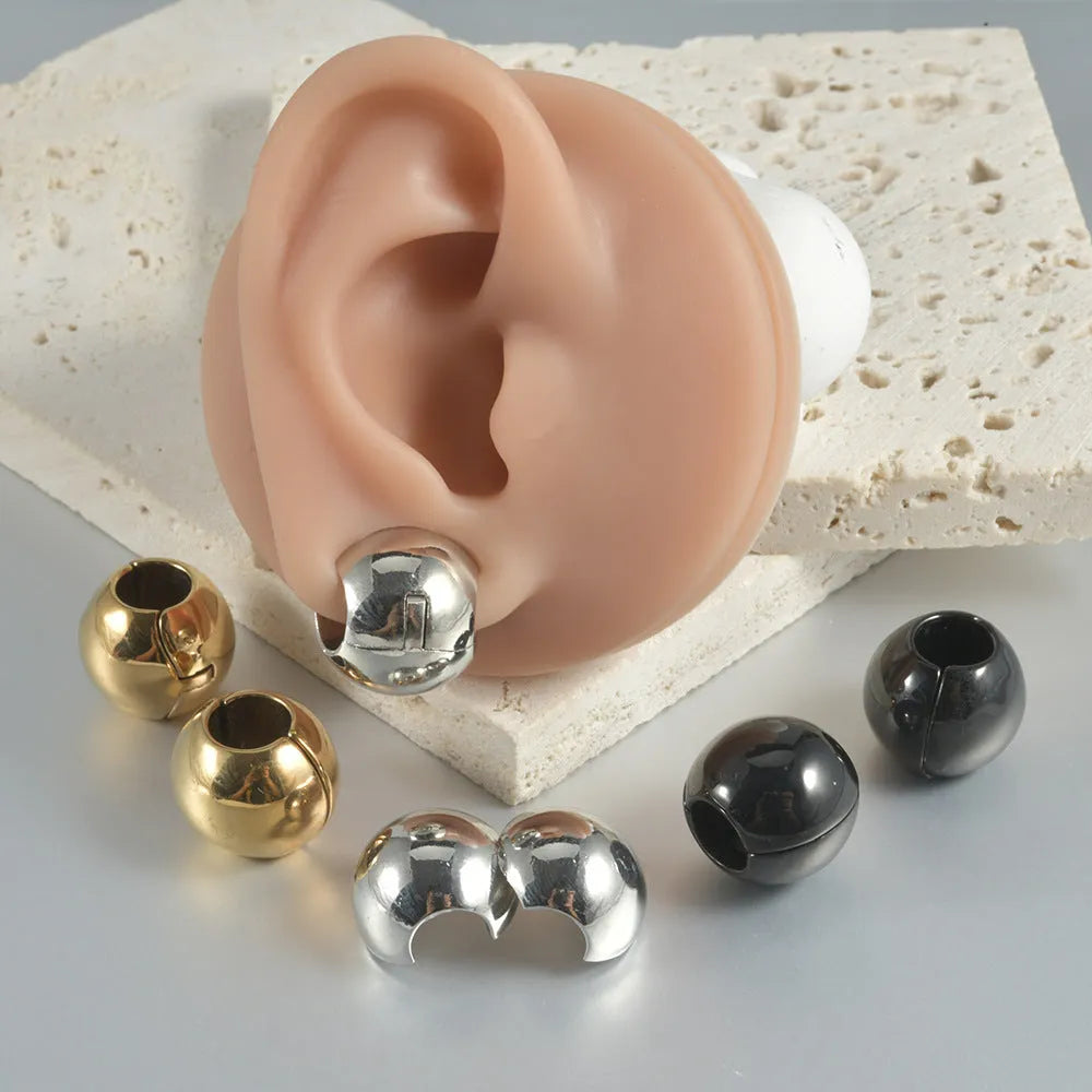 Stainless steel hollow skull Buddha earrings showing geometry shape and electroplated colour options