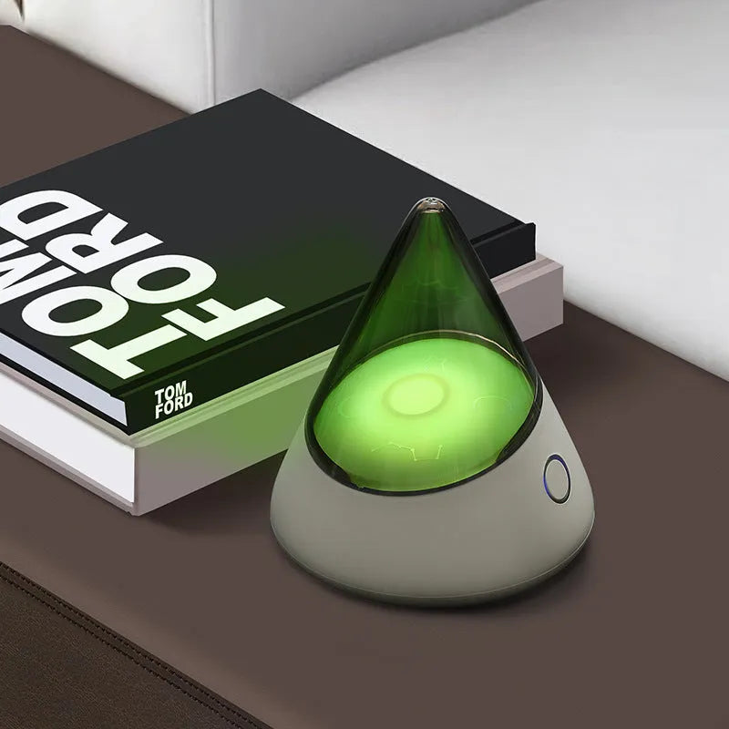 Colourful small geometric night lamp with built-in battery and Type-C charging cable on a wooden shelf