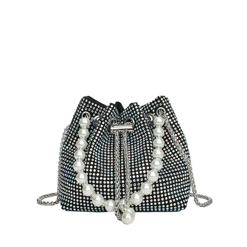Diamond pattern women's crossbody bag in PU leather with metal chain strap, showing internal phone pocket and change purse.