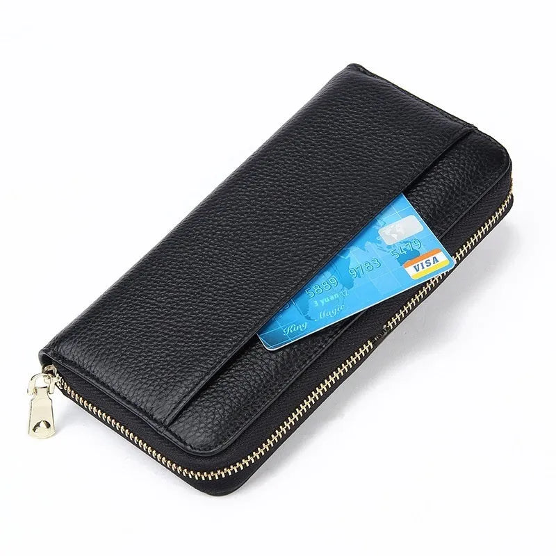 Women's long genuine leather wallet in multiple colours showing zip-around closure and anti-theft card slots.