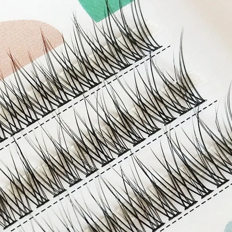 Black V-shaped fairy fishtail false eyelashes with thick segment design, showing 8mm to 12mm length options.